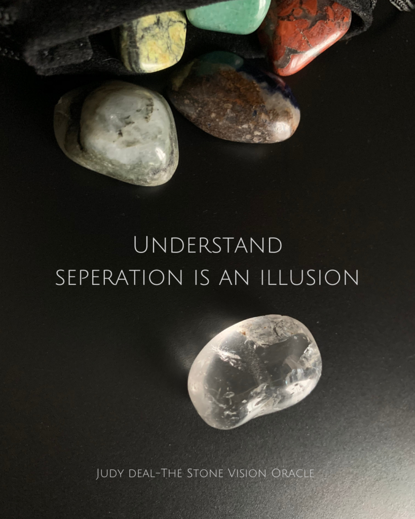 A Clear Quartz with the message Understand seperation is an illusion.